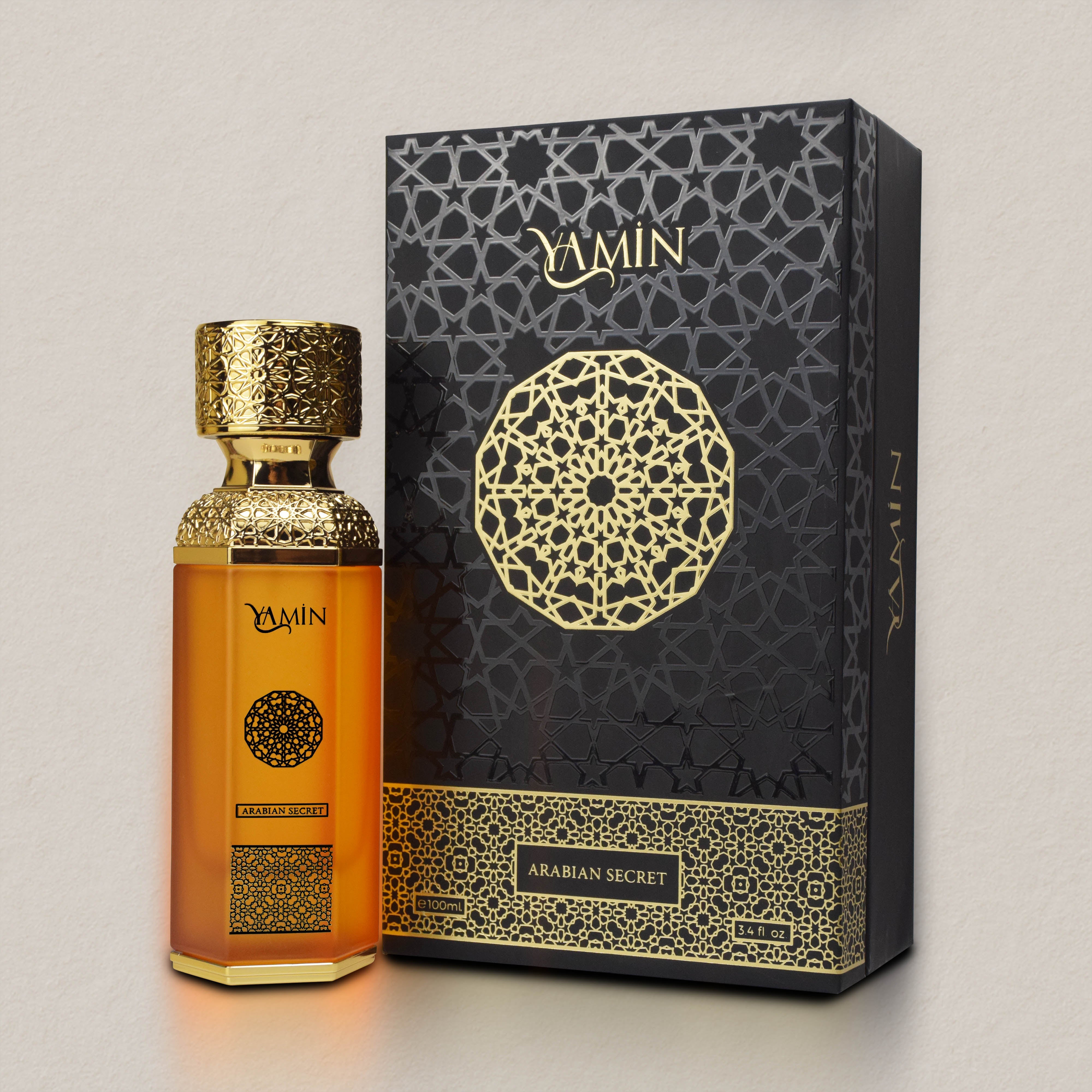 Yamin Arabian Secret perfume bottle and packaging on a light gray background