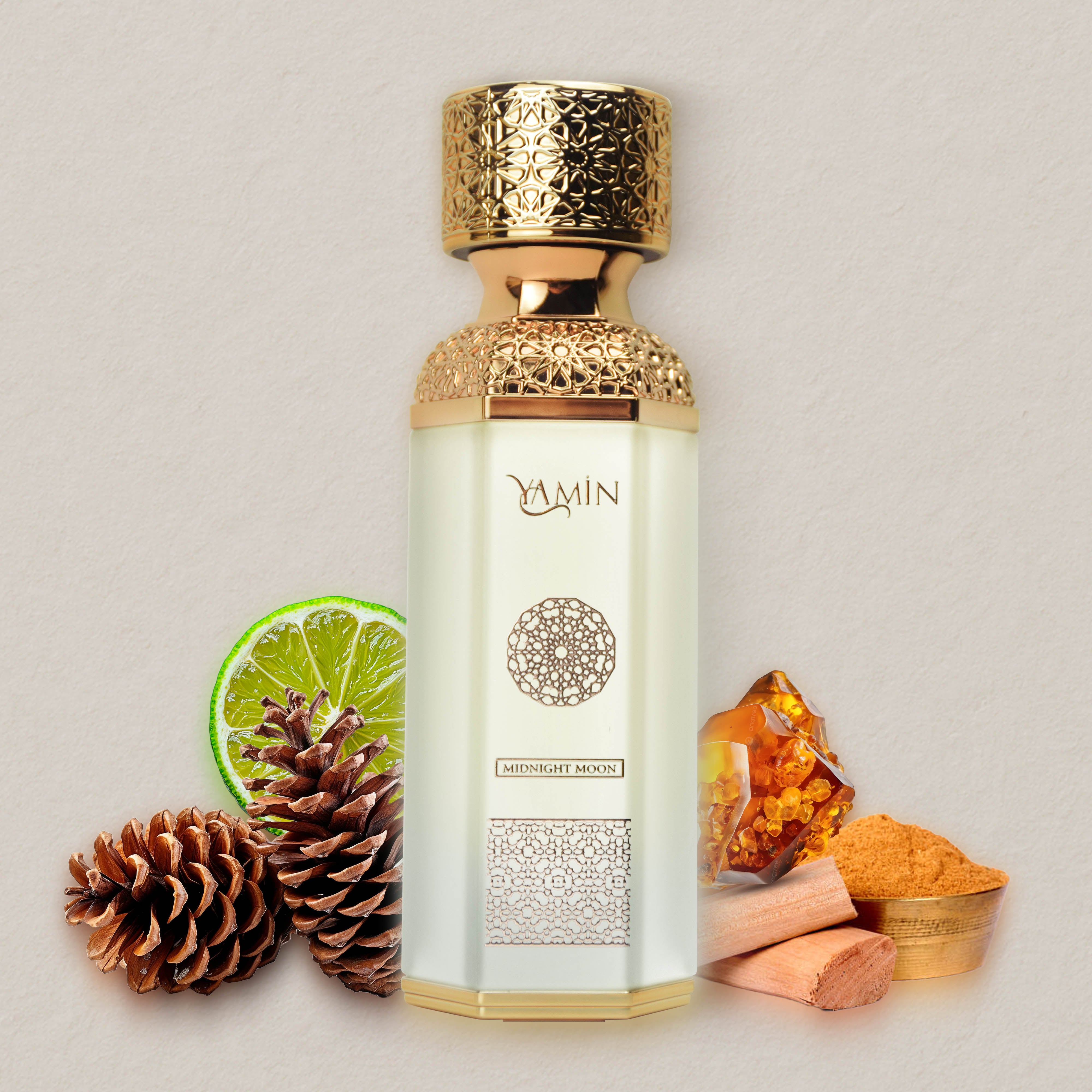 Yamin Midnight Moon perfume bottle with decorative elements on a light background